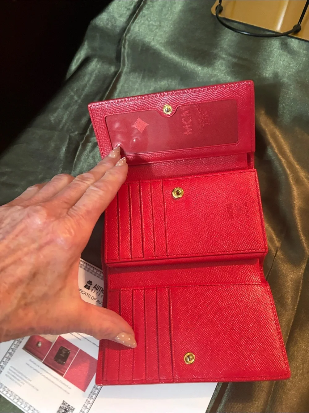 MCM Red Embossed Leather Trifold Wallet with Gold Plaque Accent